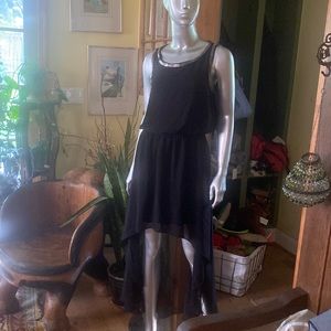 Gorgeous Forever 21 dress  multi layer . Metal around arms and neck